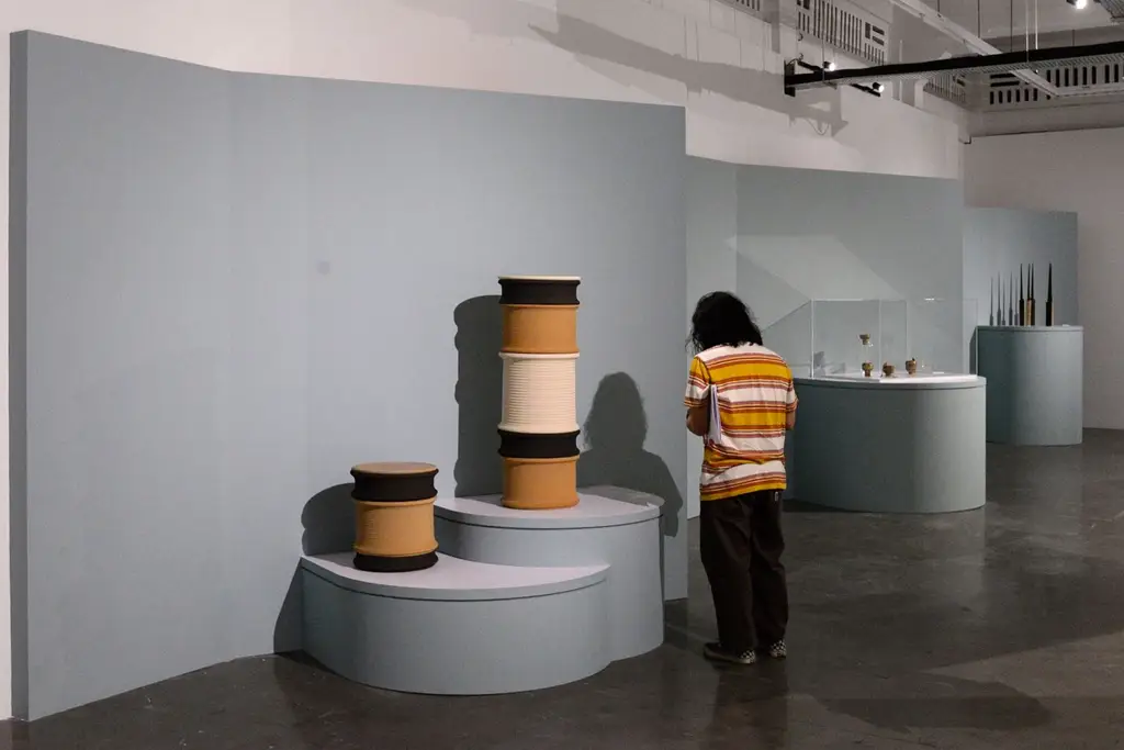 Ceramic cylinders in Wallpaper exhibtion at Gillman Barracks